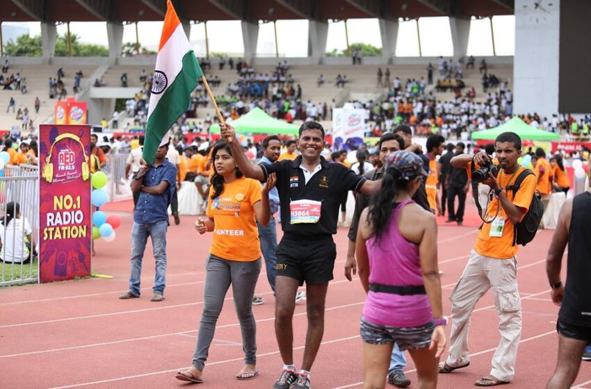  LONGEST REVERSE RUNNING BY HOLDING THE INDIAN FLAG.