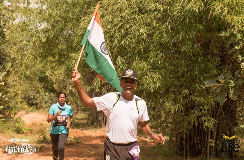  FIRST INDIAN UNSTOPPABLE ULTRA RUNNER BY HOLDING THE INDIAN FLAG.
