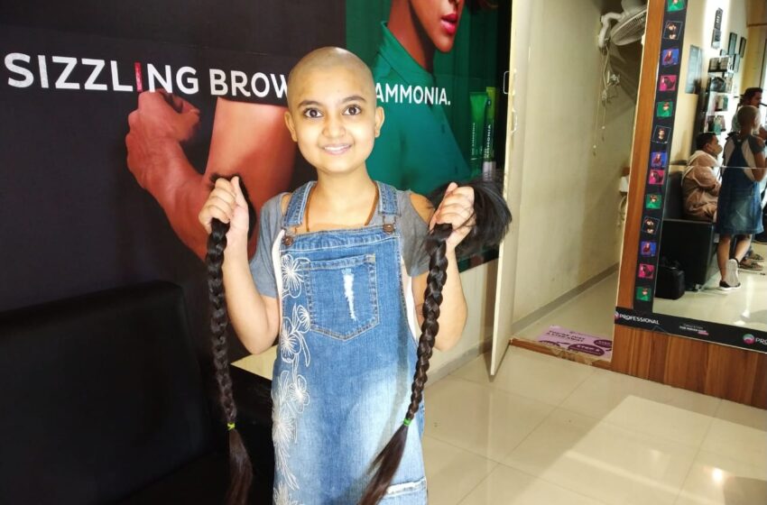  YOUNGEST GIRL TO DONATE HAIR TO CANCER PATIENTS.