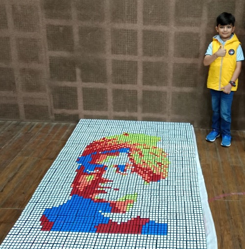  YOUNGEST TO MAKE MOSAIC PORTRAITS USING RUBIK’S CUBES