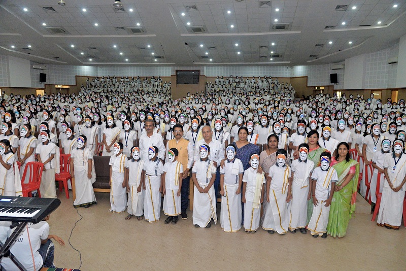  MOST STUDENTS MADE AND WEARING PORTRAIT MASK OF D. VEERENDRA HEGGADEJI